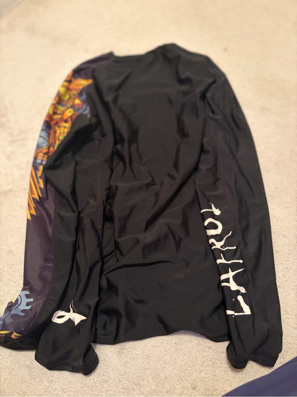 Black Long-Sleeve Graphic Tee with Vibrant Sleeve Art (swim shirt)